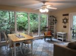 Beautiful Sunroom offers table and chairs and new couch